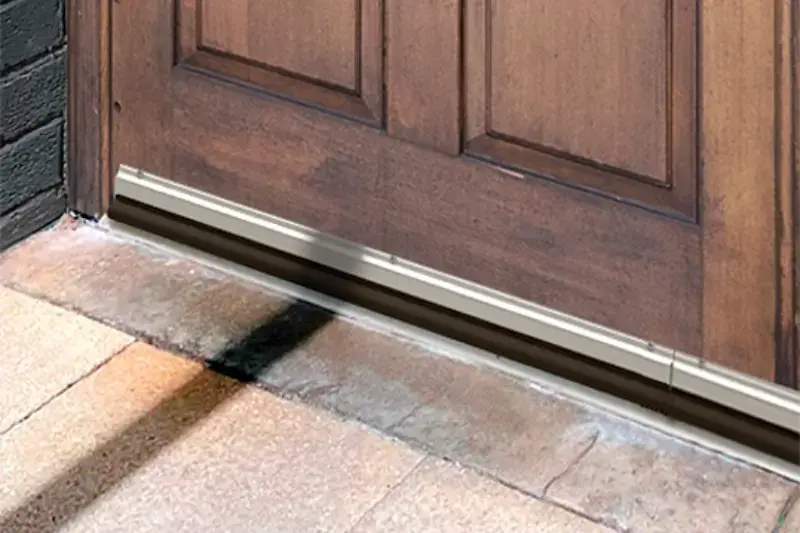 The front door of a residential home that has had the gaps sealed by Flexi Armour